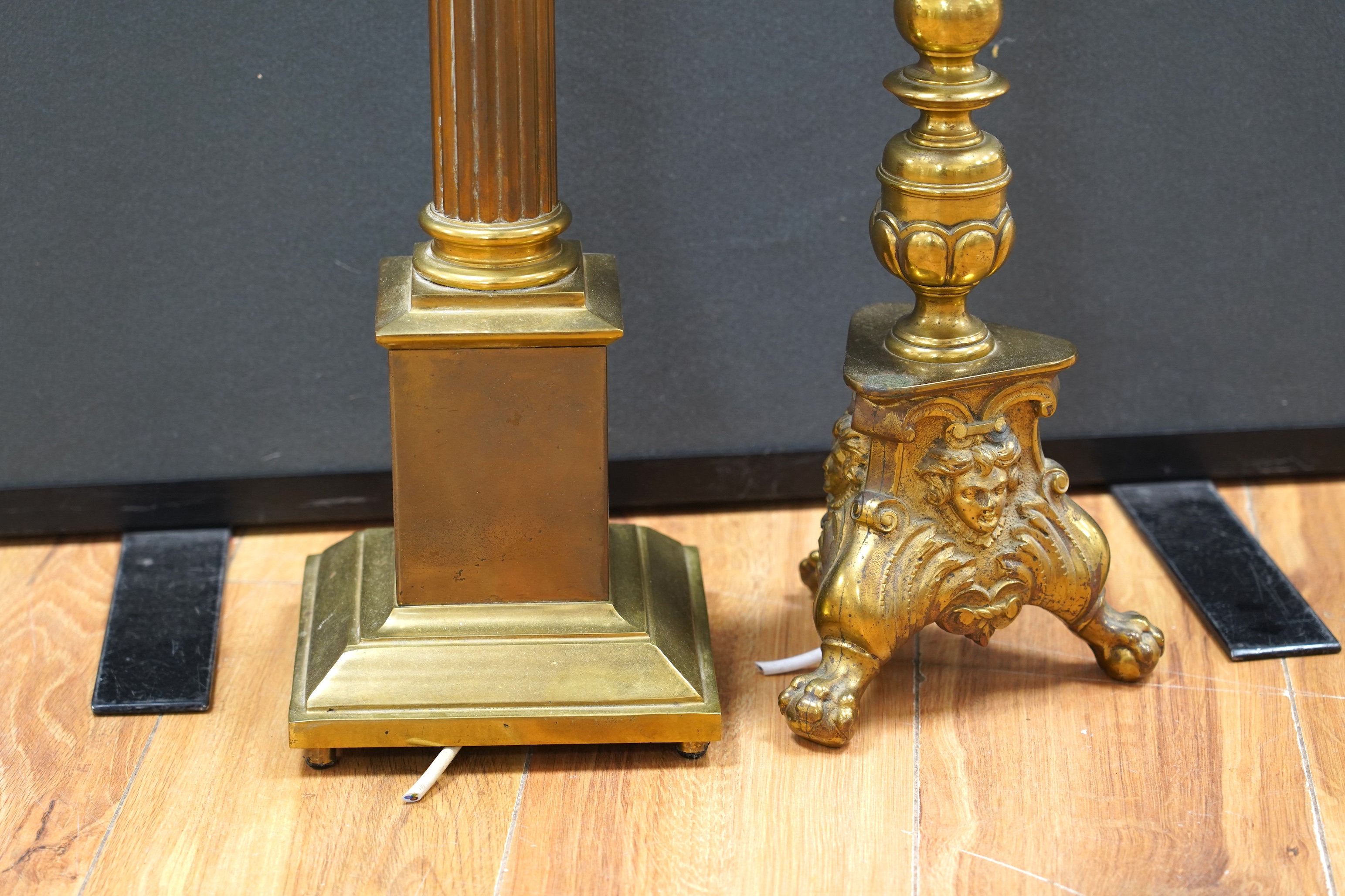 A large brass Corinthian column table lamp and another, largest 60cm excluding light fittings